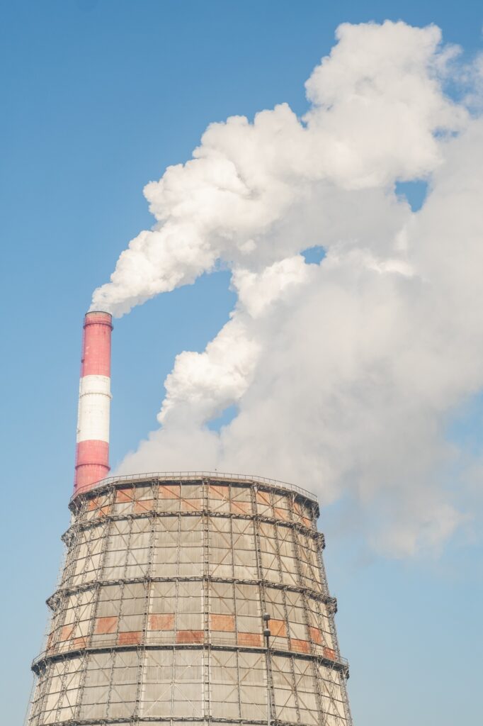 The work of a petrochemical plant. Smoke is coming from the chimney.